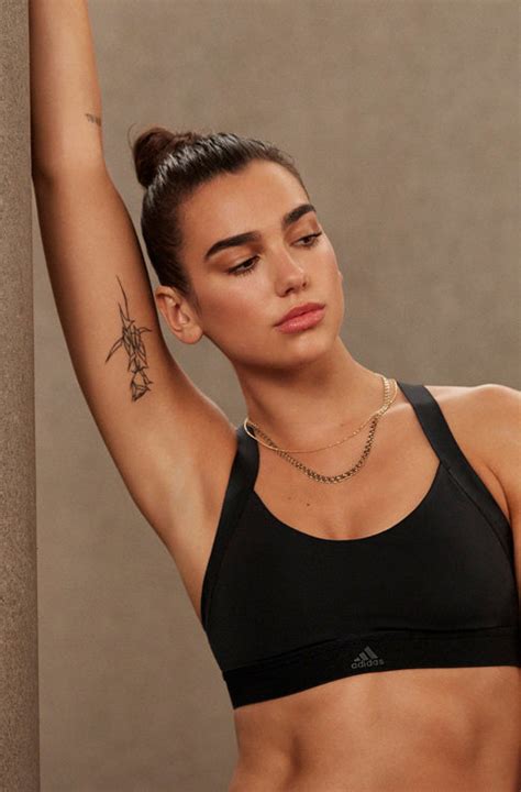 Dua Lipa’s 13 Tattoos & Their Meanings